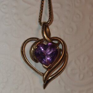 Vintage 1990s Amethyst 10k Gold heart shaped with diamond.